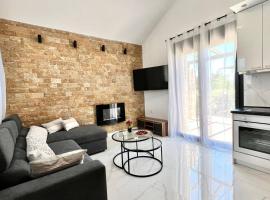 Sani stone loft villa, hotel in Kassandria