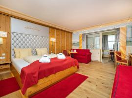 Schlosshotel Lacknerhof, hotel con spa en Flachau