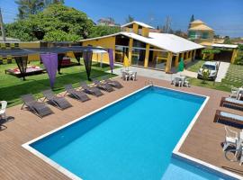 Pousada X, hotel in zona Training center for the Brazilian Volleyball Team, Saquarema