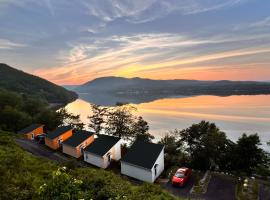 Knotty Pine Cottages, Suites & Motel Rooms, hotel v destinaci Ingonish Beach