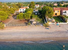 Beach Villa Next To The Waves!, hotel with parking in Istiaía
