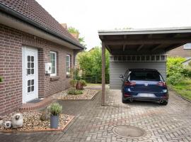 Haus Figaro mit Hund, hotel in Wangerland