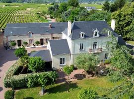 Cave Auger La Maison d'Hôtes, B&B em Restigné