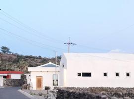 A shell in Jeju, cabaña o casa de campo en Seogwipo