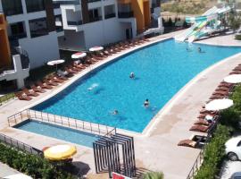 Mersin condominium Life City with pool and sea, hotel amb aparcament a Erdemli