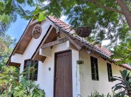 Didi Lodge - Cabaña cálida y acogedora!, casă de vacanță din Cañas