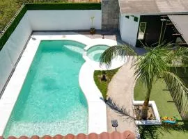 Incredible in-town pool house with BBQ area
