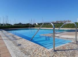 Villa a schiera con uso piscina，阿普利亞瑪莉提馬的飯店