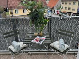 Stilvolles und modernes Appartement mit sonnigem Balkon in Flughafen- und Messenähe 31, отель с парковкой в Лайнфельден-Эхтердингене