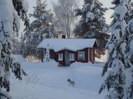 Lysti Cottage by the lake and magical countryside, lomamökki Rovaniemellä