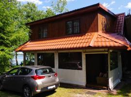 Okuninka Domek nad brzegiem jeziora Białe, hotel in Okuninka