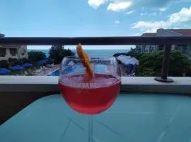 SUN AND FLOWERS APARTMENTS in front of the sea