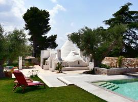 Lauku māja IL TRULLO BIANCO - Country House & SPA pilsētā Kastellana Grotte