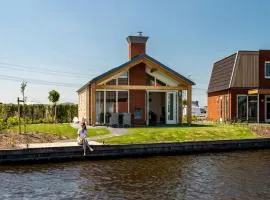 Disabled house on the water, on a holiday park in Friesland