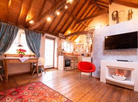 Snow Cottage laid back style with footpaths to a great Macro Brewery Pub, casa rústica 