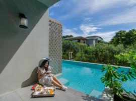 Proud Phuket Hotel, Naiyang Beach، فندق في شاطئ ناي يانغ