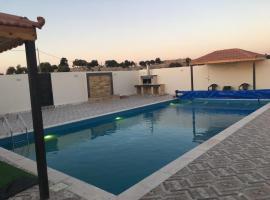 Poolside Perfection - Private Pool & BBQ, hotel a Irbid