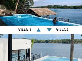 Villa Assinie Bord de Lagune, hotel with pools in Assinie