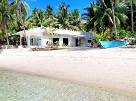 BEACH FRONT WHITE HOUSE VILLA, holiday home in Maria