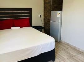 Summit Guesthouse Tasbet Park, hotel en Witbank