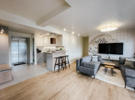 Penthouse Słoneczna Rapsodia - blisko Parku Zdrojowego - duży taras na dachu - piękny widok - winda - garaż, hotel in Rabka