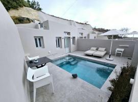 Petroma Cave Suites, hotel in Vourvoulos