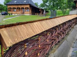 casa de lemn, renta vacacional en Văleni