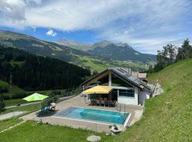 Pool Villa Savognin, Ferienhaus in Tinzen