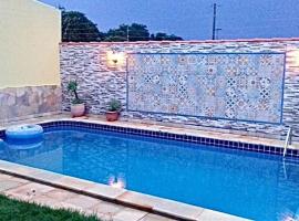 Vila agradável e confortável com piscina, feriehus i Pirenópolis