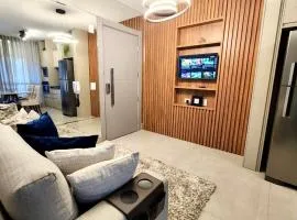 Estúdio Luxuoso no Vertigo com Smart TV na Cama