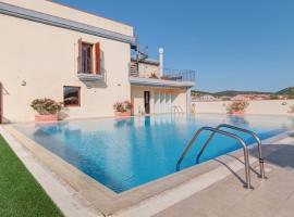 ISA-Residence with swimming-pool in Villasimius, apartments with air conditioning and private outdoor space, aparthotel a Villasimius