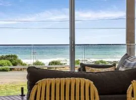 Six Degrees - beach across the road