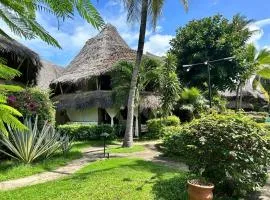 Gemütliches Ferienhaus am weißen Sandstrand