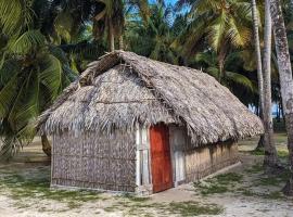 Cabañas tradicionales en isla Aroma, puhkemajutus sihtkohas Warsobtugua