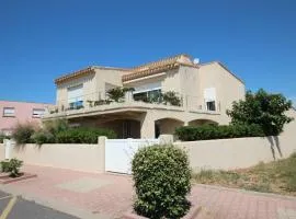 FACE à la Mer, Superbe appartement climatisé au RDC d'une maison, classé 4 étoiles, 5 couchages -WIFI-PORTIRAGNES PLAGE LXBFM32
