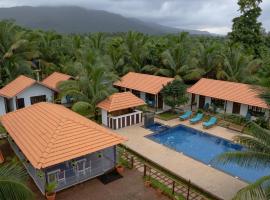 DhanRains Moonlight Retreat Cottages, hotel with pools in Palolem