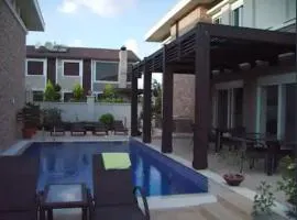 Luxurious 4-Bedroom Villa Retreat Near Beach & Forest