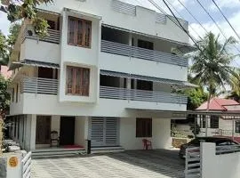 PAZHOOR RESIDENCY HOME STAY THREE BED ROOM Deluxe