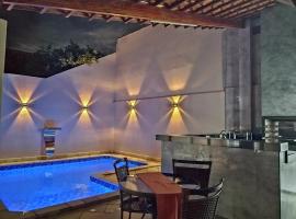 Piscina Aquecida Placa Solar, Ar condicionado Casa Inteira,Caminhos da Canastra，位于圣若昂-巴蒂斯塔-杜格罗里亚的酒店