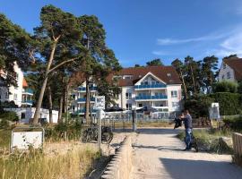 Blaumuschel Haus A Wohnung 10 Seeblick - DH, hotel in Lubmin