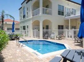 Large family condo close to the beach with pool!