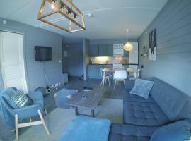 Fjellstova Storehorn Apartments, hotel con campo de golf en Torset