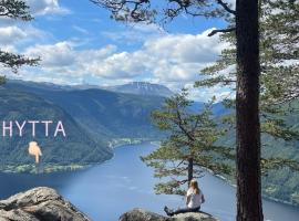 Stor hytte med 4 soverom og panoramautsikt over Tinnsj&oslash;en ved Rjukan og Gaustatoppen, hotel na praia em H&aring;k&aring;nes