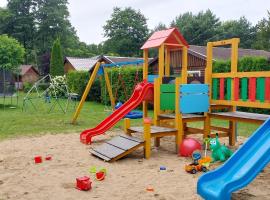 Domki Słoneczny Brzeg: Dąbki şehrinde bir otel