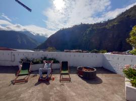 Hostel Plantas y Blanco, hotel in Baños