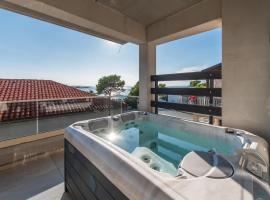 Apartments Oliv'e with jacuzzi, hotel with jacuzzis in Novalja