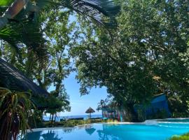 Camiguin Island Golden Sunset Beach Club โรงแรมติดทะเลในมัมบาเฮา