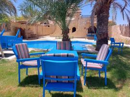 Tunis Lake View 2 โรงแรมในQaryat at Ta‘mīr as Siyāḩīyah