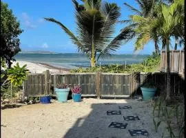 Unique : Pieds dans l'eau face au lagon