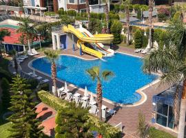 Penthouse 4 bedrooms, 1 living room, to the sea 7 minutes walk, familiehotell i Alanya